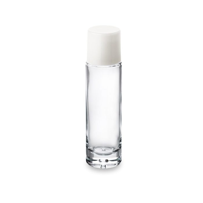 Un bouchon blanc sur un flacon cosmétique verre Premium 50 ml