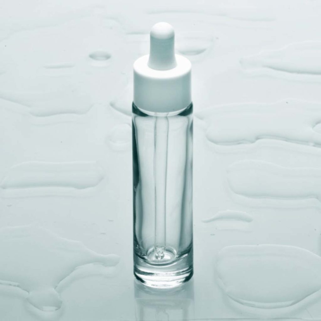 flacon cosmétique en verre 50 ml et compte-gouttes blanc packaging fin et élancé